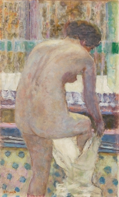 Nude getting dressed by Pierre Bonnard