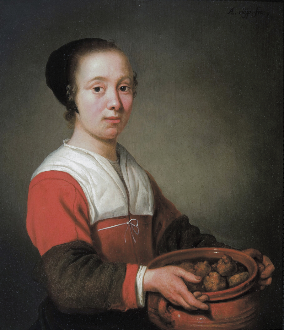 A Woman holding Oliebol Treats