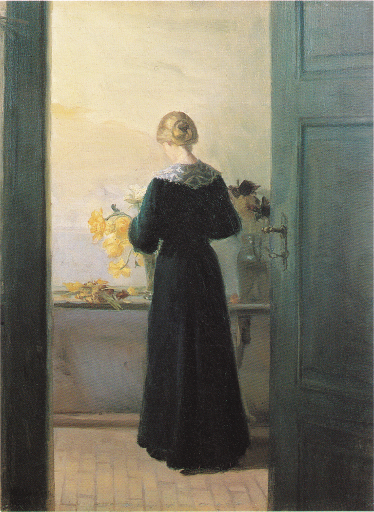 A young woman arranging flowers