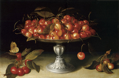 Cherries in a silver compote with crabapples on a stone ledge and a fritillary butterfly