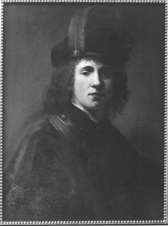 Ein junger Mann (Werkstatt) by Rembrandt