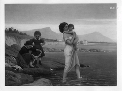 Junge Frau mit Kindern am Strand