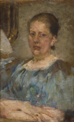 Portrait of a woman in a blue blouse by Olga Boznańska