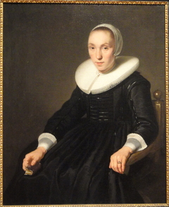 Portrait of a Young Woman with a Small Book by Bartholomeus van der Helst