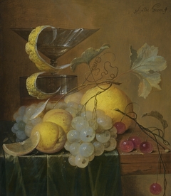 Still Life with a Wine Glass, Lemon Peel, Peaches, Grapes and Cherries on the Corner of a Partly Draped Wooden Table