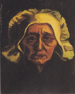 Head of an old peasant woman with a white cap by Vincent van Gogh