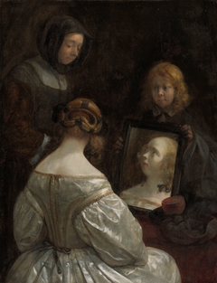 Woman at a Mirror by Gerard ter Borch II
