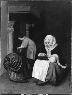 Woman sewing with Maid