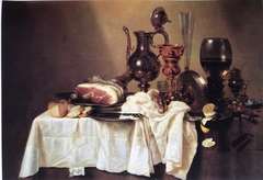 Still life with decanter and ham signed on the tablecloth