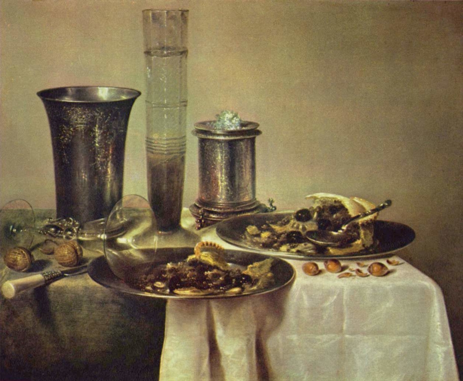 Still life with half-eaten pie, bier and silver cup on a table