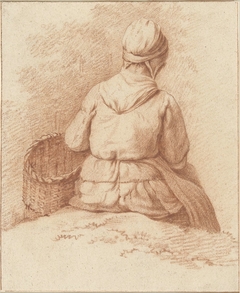 Zittende vissersvrouw met een mand aan de arm, op de rug gezien