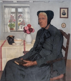 Portrait de femme assise dans un intérieur