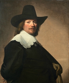 Portrait of a gentleman, three-quarter-length, in black costume with a white lace collar and a black hat