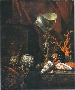 Still life with shell cup, shells, coral and lacquer box by Willem Kalf
