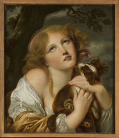 Girl with a dog in her hands