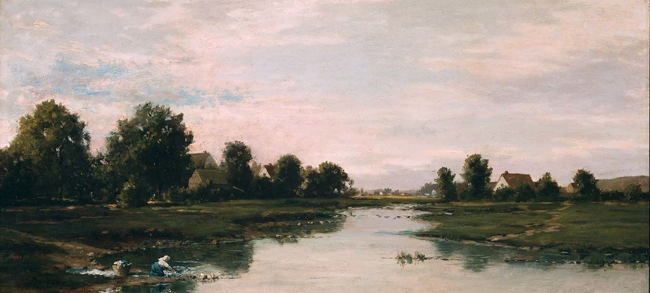 Woman Washing Clothes at the Edge of a River