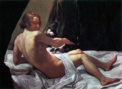 Young Naked Man on a Bed with Cat