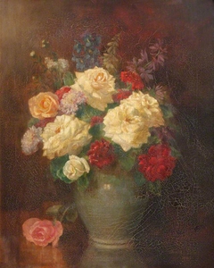 Flowers in Ceramic Vase on a Table
