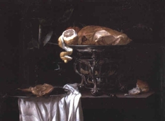 Still life of roast guinea-fowl with citrus fruit in a chafing-dish