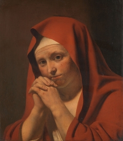 Woman praying by Caesar van Everdingen