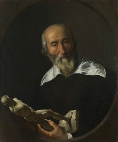 A Man holding an Armless Statuette by Anonymous