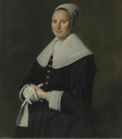 Portrait of a woman with gloves