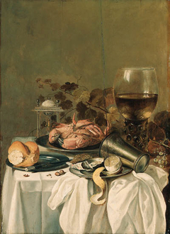 Still life with crab, oyster, lemon, twist of pepper, overturned beaker, bread, knife, roemer and salt cellar