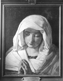 The Virgin Mary praying