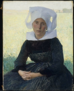 Woman in Breton Costume Seated in a Meadow