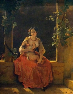 Young mother breastfeeding her child