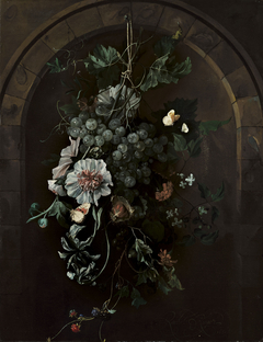 A swag of fruit and flowers suspended before a stone arch