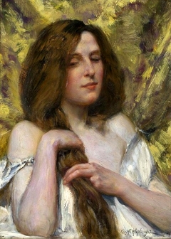 A woman plaiting her hair.
