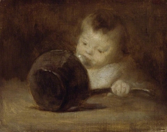 Enfant avec une casserole