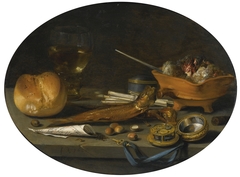 Still life with a roemer, a roll, smoked herring, a watch, smoker's requisites, hazelnuts and a brazier