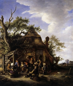 Merry company of peasants in front of an inn