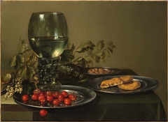 Still Life with a Roemer Cherries and Biscuits by Johannes Kuveenis