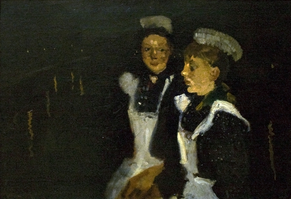 Two maids are chatting along the canals of Amsterdam