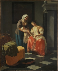 A Nurse Showing a Mother Her Child
