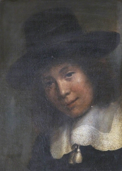 A Young Man in a Black Hat and White Lace Collar with Tassels by Dutch School