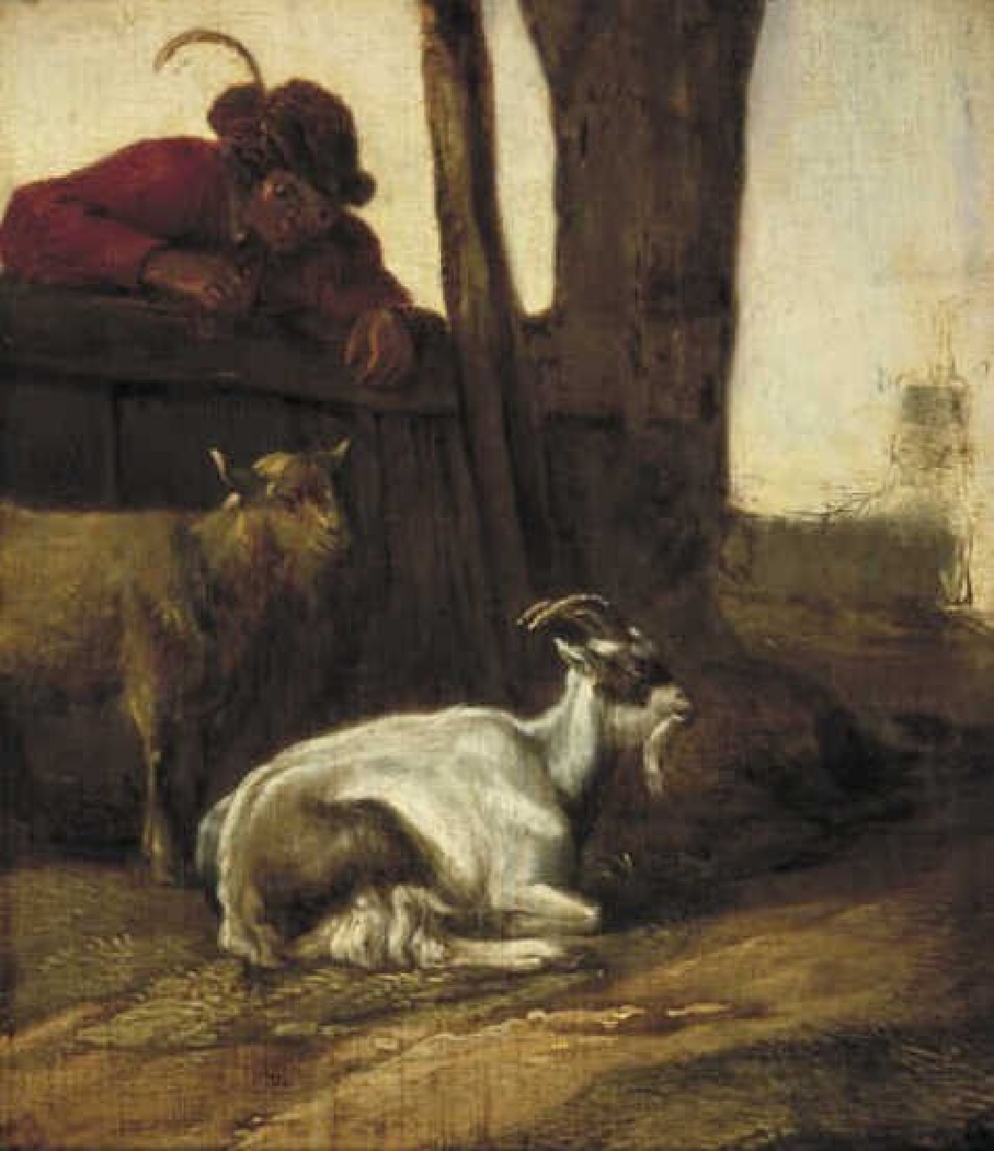 A young man with two goats