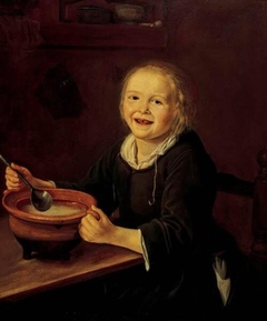 Child eating porridge