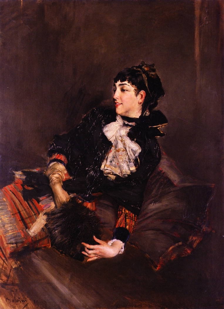 Countess Gabrielle de Rasty on a sofa