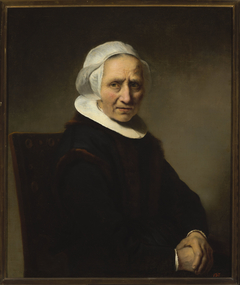 Portrait of an old woman in a white cap