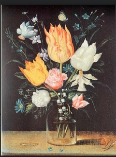 Tulips, roses, a bluebell, narcissus, lily of the valley in a glass vase