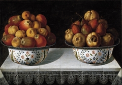 Two Fruit Bowls on a table by Tomás Yepes