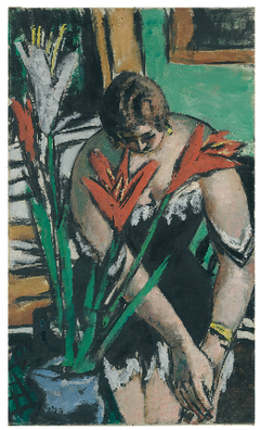 Woman at the toilet with red and white lilies